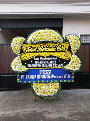 Papan Bunga Duka di Tanah Kampung