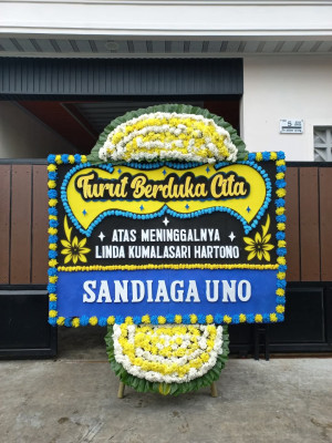 Papan Bunga Duka di Tanah Kampung